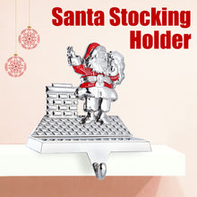 Load image into Gallery viewer, Stocking Holder - Christmas Santa Stocking Hanger for Mantel - Shiny Silver Metal Santa On Chimney Christmas Stocking Holder for Fireplace Mantle - Heavy Stocking Holder for Mantle with Hook By Klikel